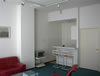 Kitchen with breakfast bar and microwave